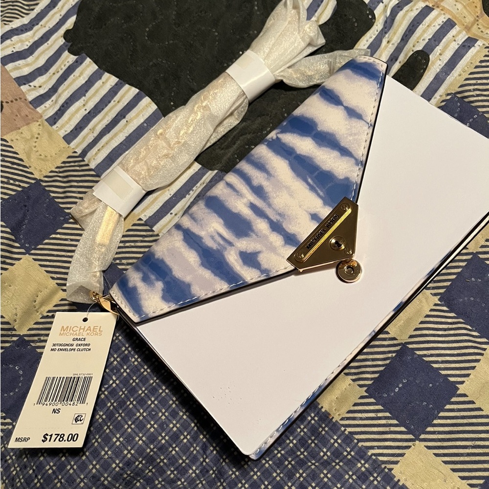 Michael Kors clutch. blue tie dye